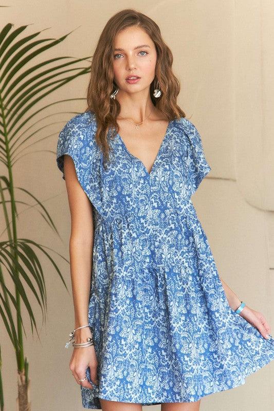 ADORA Printed V-Neck Ruffle Sleeve Mini Dress - Trendy by Luna