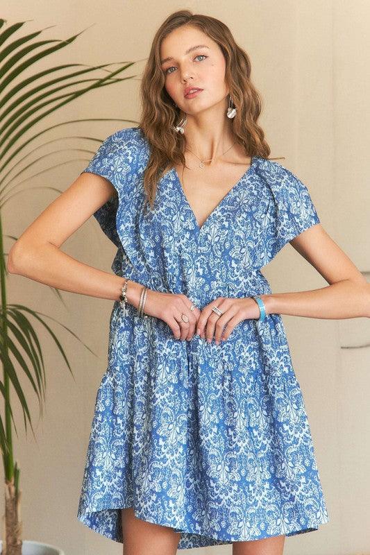 ADORA Printed V-Neck Ruffle Sleeve Mini Dress - Trendy by Luna