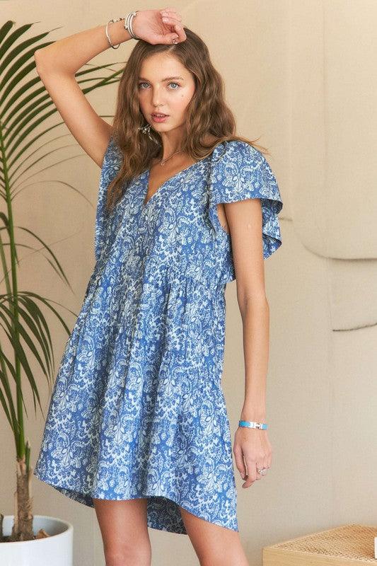 ADORA Printed V-Neck Ruffle Sleeve Mini Dress - Trendy by Luna
