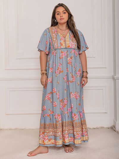 Plus Size Printed Tie Neck Flutter Sleeve Maxi Dress - Trendy by Luna