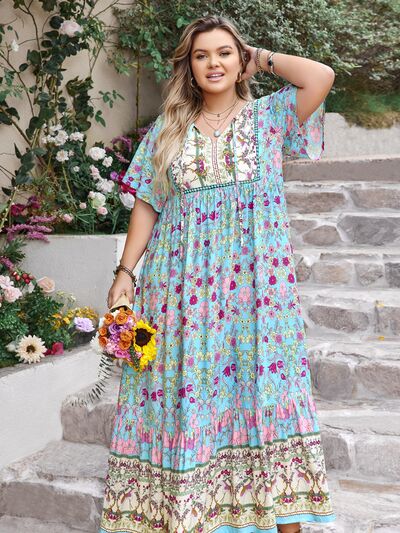Plus Size Printed Tie Neck Flutter Sleeve Maxi Dress - Trendy by Luna