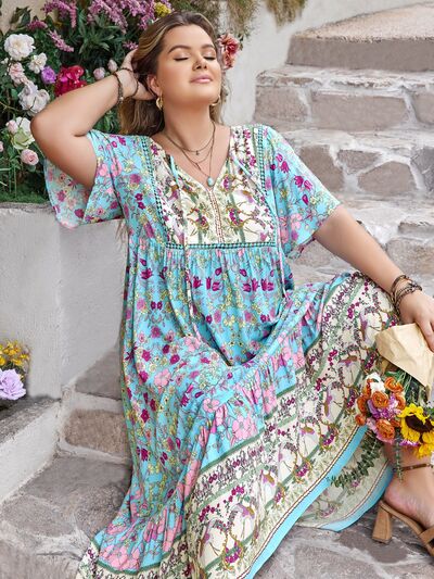 Plus Size Printed Tie Neck Flutter Sleeve Maxi Dress - Trendy by Luna