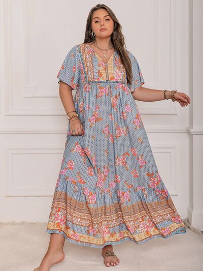 Plus Size Printed Tie Neck Flutter Sleeve Maxi Dress - Trendy by Luna