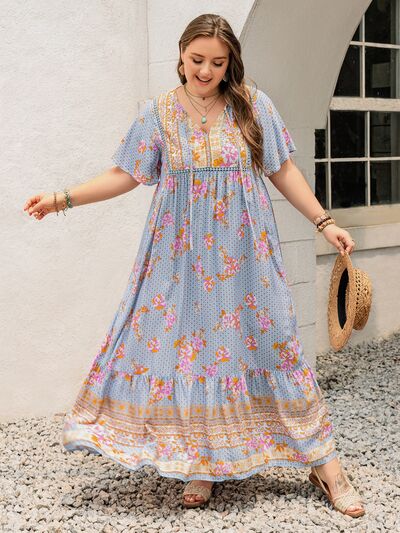 Plus Size Printed Tie Neck Flutter Sleeve Maxi Dress - Trendy by Luna